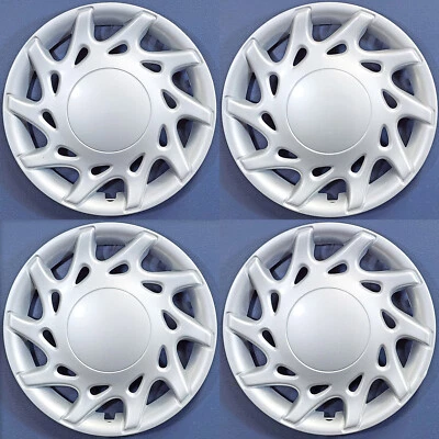 Dodge/Plymouth 1995 neón # 501 tapacubos/cubiertas de rueda # 4684051 juego usado/4 Foto 1 de 4