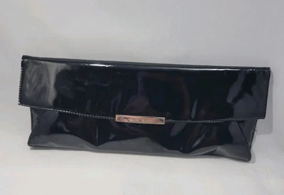 Bolso sin asas negro con acabado de patente del mercado negro de la Casa Blanca cierre magnético Foto 1 de 4