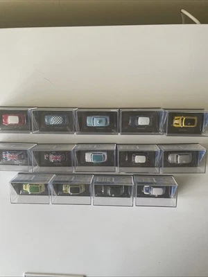 Bundle Of 14 Mini Coopers Die Cast Model  Cars By Cararama/Hongwell New In Cases - Image 1 of 4