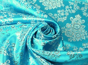 LUREX JACQUARD Stoff Brokat Rosenbouquet Kostüme TÜRKIS SILBER EUR 16,98/m - Bild 1 von 3