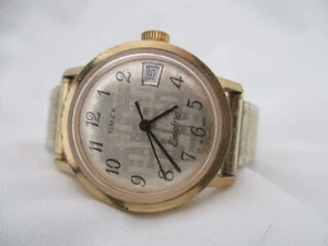 Reloj de pulsera eléctrico analógico Timex con banda de expansión tono dorado indicador de fecha - Imagen 1 de 12