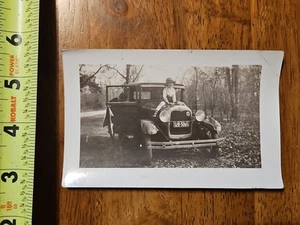 RARE OLD VINTAGE PHOTO KID SITTING ON HOOD OF VEHICLE 1930 GHOST DOG ABSTRACT - Picture 1 of 6