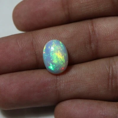 10x14 MM 4.1 Cts Natural AAA Green Fire White Ethiopian Opal Oval Cabochon - Image 1 of 4