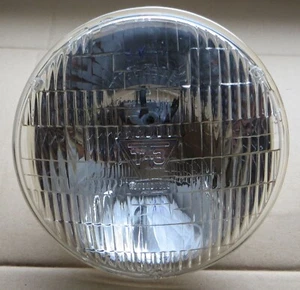 NOS OEM Harley Panhead 7” Guide T-3 Head Light Lamp Sealed Beam 6V # 67717-48B - Bild 1 von 10
