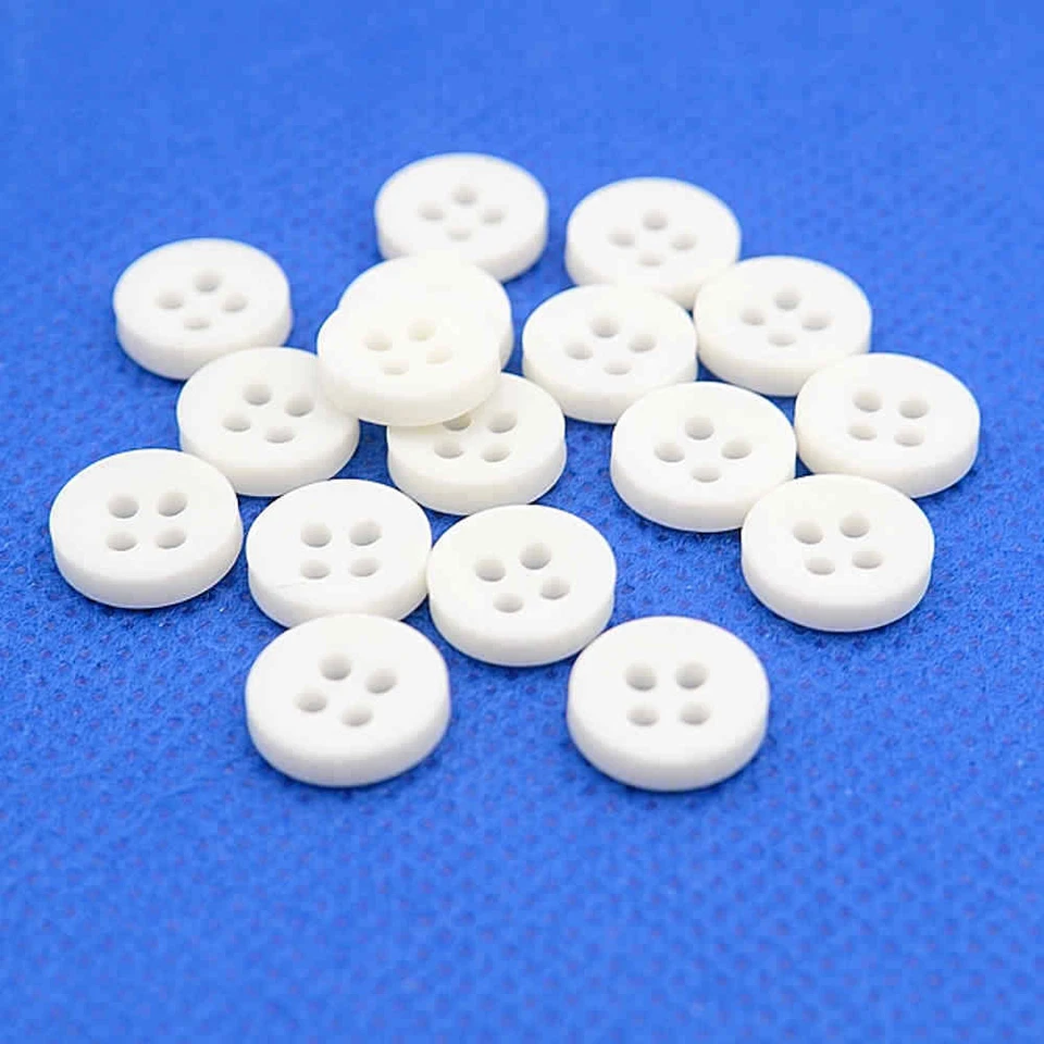 MATT DULL WHITE 4 HOLE SHIRT BUTTONS 10mm - Image 1 of 1