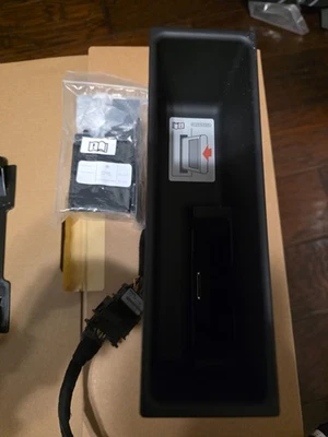 VW iPod interface Part Number 1K0-857-925-E with inserts for different models - Image 1 of 4