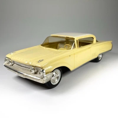 1960 AMT Corp. Yellow MERCURY PARKLANE 2-Door Hardtop 1:25 Friction PROMO Car - Image 1 of 4
