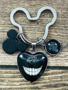 We're All Mad Here Cheshire Cat Mickey Llavero Mochila Etiqueta Brillo Cartera Dije - Imagen 1 de 1