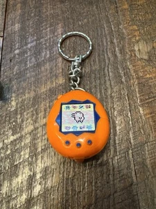 VTG 90s Tamagotchi Keychain Orange Egg Lime Green Pet McDonalds 1990s Grt Cond - Picture 1 of 2