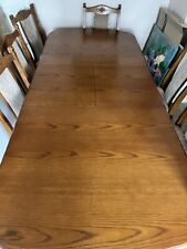 solid wood dining table and 6 chairs