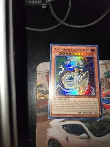 Yu-Gi-Oh! Archnemeses Protos UR (RA03-EN023) Quarter Century Bonanza 1st Edition - Picture 1 of 3