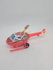 JIMMY TOYS 80's 7'' RED FLYING STAR HELICOPTER TIN & PLASTIC SPINNING BLADES TOY - Picture 1 of 4