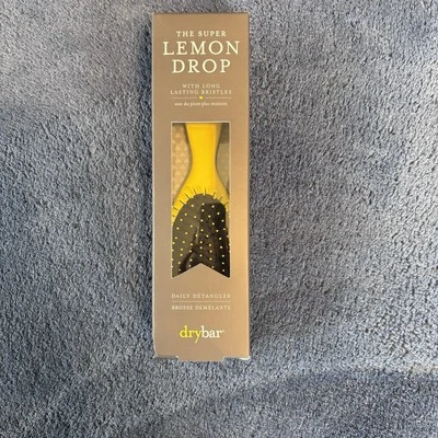 Cepillo desenredante Drybar The Super Lemon Drop Foto 1 de 4