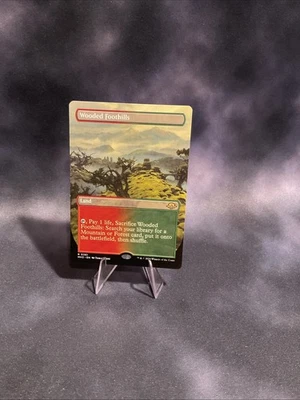 Wooded Foothills (Borderless) Modern Horizons 3 Regular - Image 1 of 2