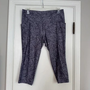 Athleta Salutation Stash Pocket ll Print Capri Gr. M Tempest Violet Gr. XL - Bild 1 von 6