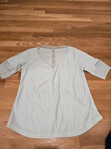 Top manga corta lululemon talla 4, verde menta ¡EXCELENTE ESTADO USADO! - Imagen 1 de 6