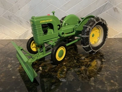 John Deere 1/16 Diecast Tractor Replica by SpecCast - LA w/Chains And Snow Blade - Image 1 of 4