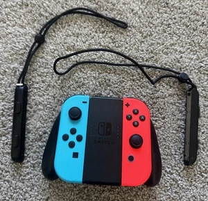 Nintendo Switch Joy-Cons Pair Controller With Joycon Grip Neon Blue and Neon Red - Picture 1 of 7