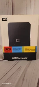 Western Digital Elements 320 GB,External,7200 RPM (WDBAAR3200ABK) Hard Drive - Picture 1 of 8