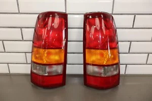 05-07 GMC Sierra 1500 2500 3500 Pair LH & RH Tail Light Lenses *Hazy* - Picture 1 of 23