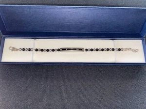 Bracciale BLISS in acciaio e ceramica, pallini nero argento e incastonatura - Foto 1 di 4