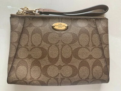 Muñequera sin asas Coach Signature de cuero PVC Morgan F65060 caqui/silla de montar nueva con etiquetas Foto 1 de 4