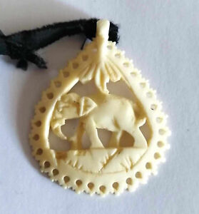 Unique vintage/antique carved elephant pendant