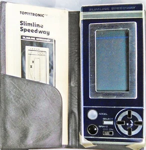 VINTAGE TOMYTRONIC SLIMLINE SPEEDWAY HANDHELD ELECTRONIC GAME W/ BOOKLET WORKS! - Picture 1 of 1
