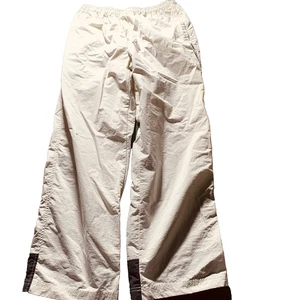 Pantaloni Nike Ripstop Uomo Grandi Pista Palestra Pull On Coulisse Colorblock Abbigliamento Sportivo - Foto 1 di 14