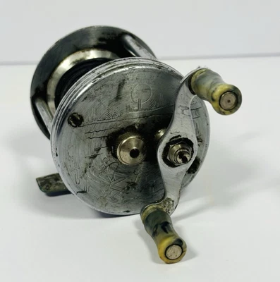 Carrete de fundición Bronson 2550 Mercury grabado con joyas Levelwind Foto 1 de 4