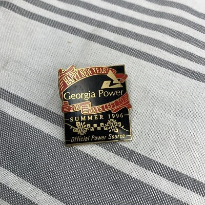 1996 Black and Red Georgia Power Happy New Year Olympic Pin - Image 1 of 2