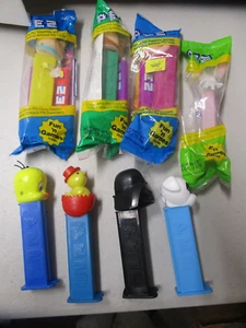 Pez Spender Set 8 Stück Fred Barney Tweety Dino Bunny - Bild 1 von 6