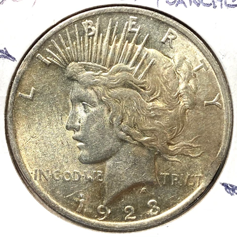 1923 $1 Silver Peace Dollar, MINT ERROR, CLIPPED PLANCHET on Rim X2  (73259) Cover