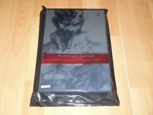 ART BOOK OF METAL GEAR SOLID TACTICAL ESPIONAGE ACTION NEW FACTORY SEALED - Foto 1 di 2