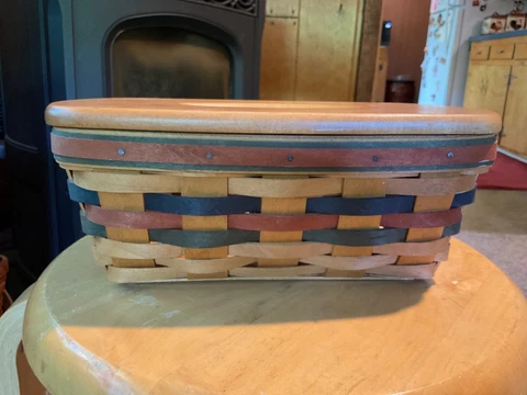 1998 Longaberger Tissue Basket with Wooden Lid.  10” L x 6” W X 3.5” H Cover