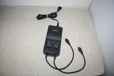Cargador Canon NC-E2 Ni-MH para batería NP-E3 - Probado Foto 1 de 4