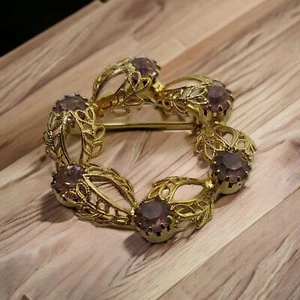 VTG Circle Brooch Gold / Amethyst color rhinestones Prong set 1.5" - Picture 1 of 5
