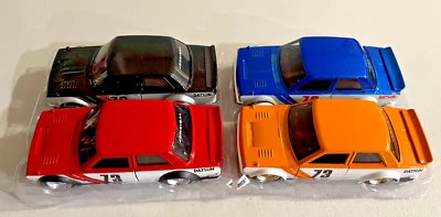 Juego 4 afinadores Jada 1:32 JDM Datsun 510 1973 carrocería ancha rojo/negro/azul/naranja Foto 1 de 2