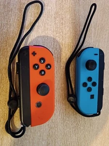 Nintendo Joy-Con Paire de Manettes - Rouge/Bleu - Photo 1/2