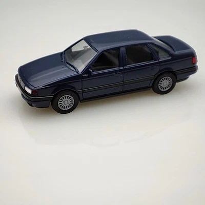 Herpa  VW  Passat Limousine  1:87 - Modellauto blau - Bild 1 von 4