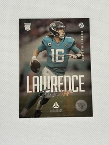 2021 Panini Chronicles - Trevor Lawrence Luminance Update Rookies #201  - Picture 1 of 2