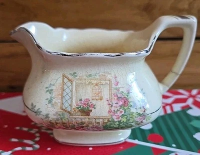 Flores Lido vintage de W.S. Crema tono canario George con esmalte de uranio  Foto 1 de 4