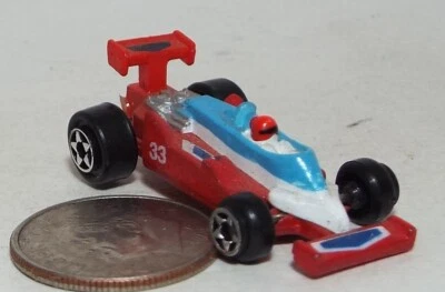 Very Small Micro Machine 1980's Indy style Race Car Red,/White /Blue number 33 - Image 1 of 3