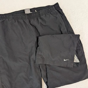 Pantalones cortavientos Nike para hombre M 31x30 negros Y2K algodón forrado cordón - Imagen 1 de 8