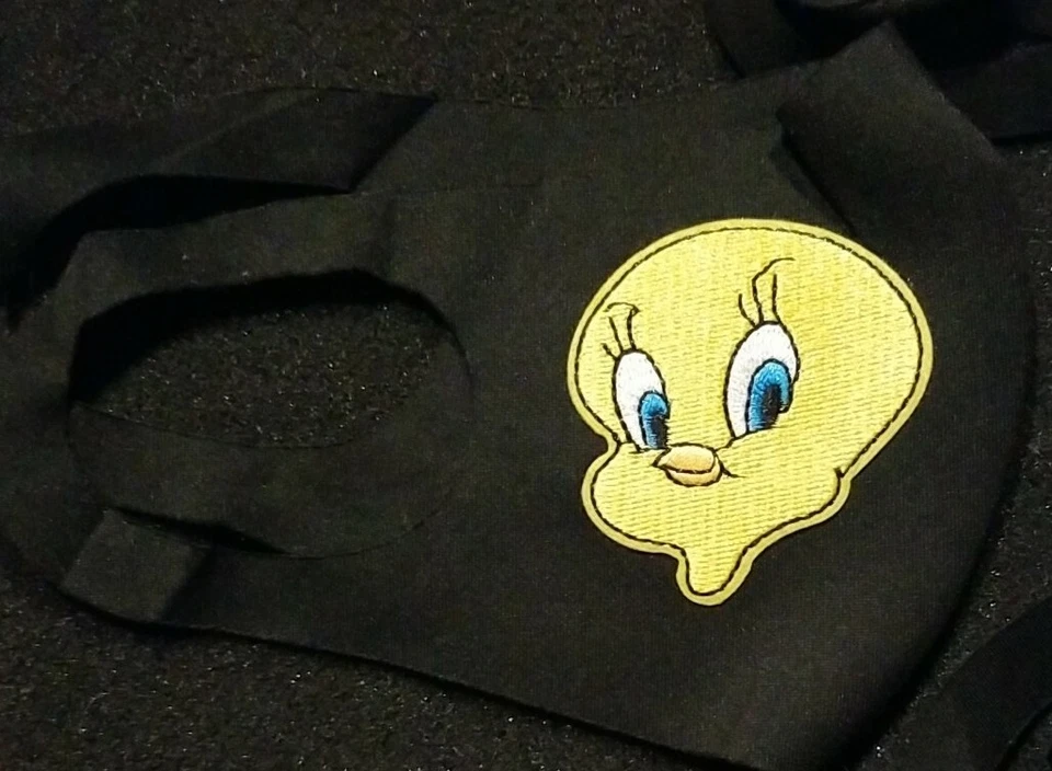 FACE MASK TWEETY FABRIC Washable Print Fabric made USA  - Image 1 of 1