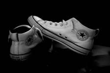 white leather converse with black stripe
