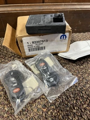 New Genuine NOS Mopar 82207513 Keyless Entry Kit With 2 Keyfobs  - Image 1 of 4