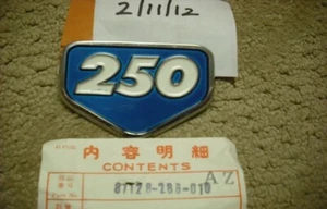 Honda CB250 Aquamarine Sidecover Badge NOS New 871-28-286-010 sku 3112 - Picture 1 of 3