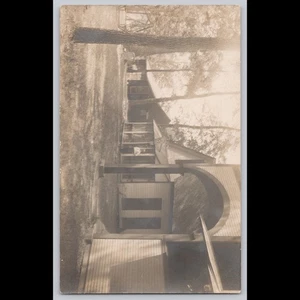 Foto postal real 1918 edificios árboles - Imagen 1 de 3