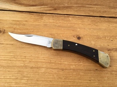 BUCK 110 HUNTER  FOURTH VERSION, TYPE 4   4-DOTS   425M BLADE   1983-1986    USA - Image 1 of 4